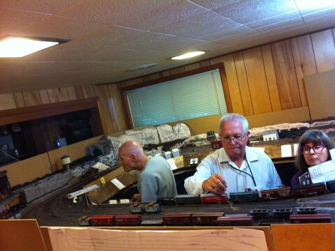 Operators switching cars in the yard on Allen's layout
